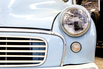 Close Up of Headlight Lamp Vintage Classic Car. (Vintage Effect Style)