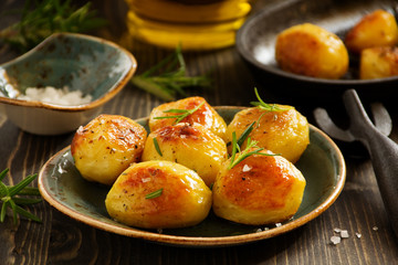 Baked potatoes with rosemary.