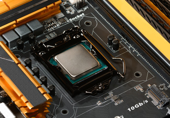 .Modern processor fitted with the PC motherboard with a cascade of power