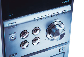 Hand on Sound volume control knob