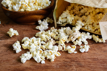 Popcorn on wooden table