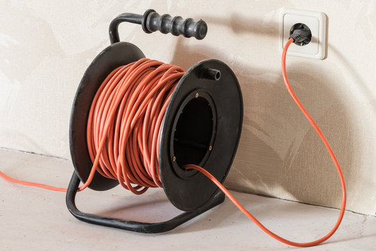 Long Orange Electrical Extension Cord