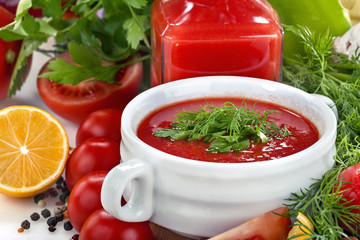 Domestic tomato soup with herbs and spices
