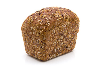Baked rye bread with linseeds on the white isolated background