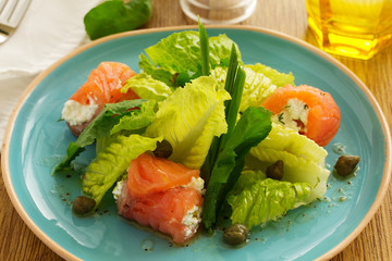 Salad rolls with salmon and cottage cheese.