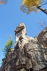 Fototapeta na wymiar The Idol Rock - Stone guards of Olkhinsky plateau. Rocky outcrops formed by the weathering of rocks