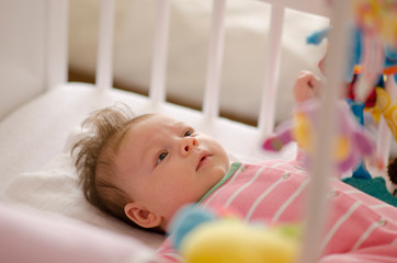 baby in a cot