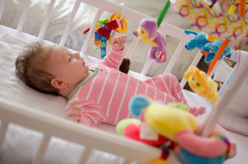 baby in a cot