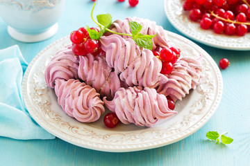 Homemade marshmallows with fresh berries.