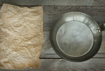 Kitchen accessories on vintage wooden table.Top view with copy space.
