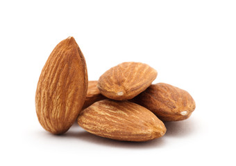 group of almonds isolated on white