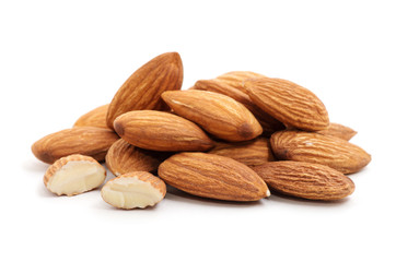Heap of almond nuts isolated on white background