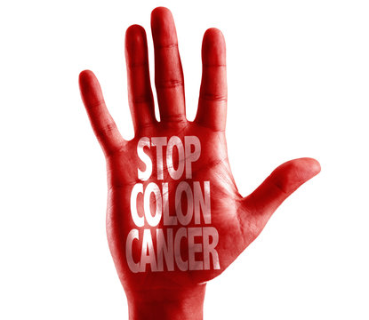 Stop Colon Cancer written on hand isolated on white background