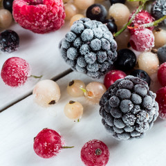 frozen berries: black currant, red currant, blackberry, blueberry, white currant. top view, macro.