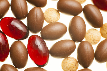 Macro photograph of various colorful medicinal pills