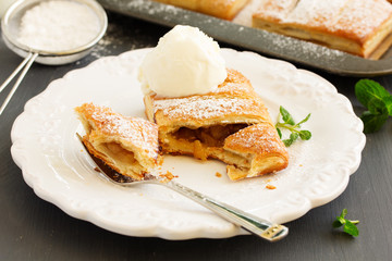 Homemade cakes and puff pastry with apples and caramel.