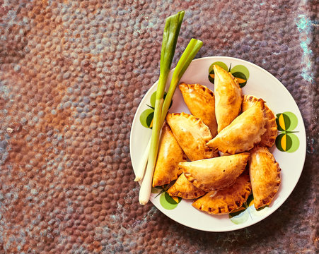 Meal of Empenadas and Green Onions