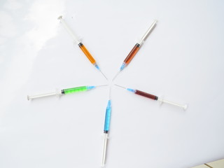 Fototapeta premium Colorful Medical Syringes