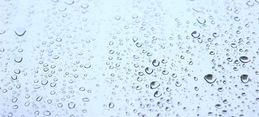 Fototapeta na wymiar Rain drops on window