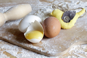 ingredients for baking Passover/Easter composition with a bird during the preparation of the dough