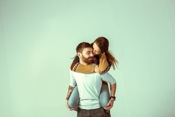 Studio shot of beautiful young couple 