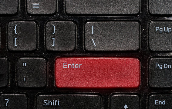 red enter button on black keyboad
