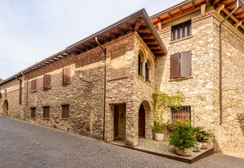 Picturesque small town street view in Sirmione, Lake Garda Italy.