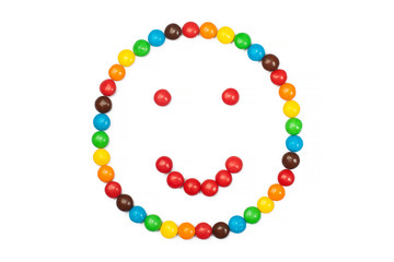 Emotional sign of colored glazed candies