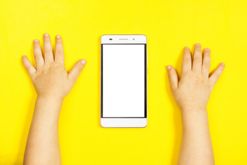 smartphone in the hands of a child