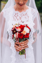 Beatiful bride with  boquet  in the hend
