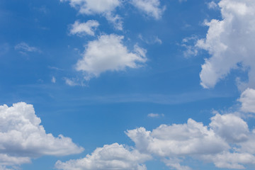 fluffy cloud on clear blue sky background