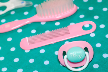 Set of pacifier and brushes for newborn babies
