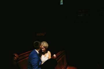 Fototapeta na wymiar bride and groom illuminated by light