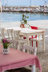 Fototapeta na wymiar Summer outdoor terrace cafe on sand beach