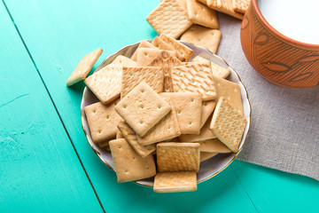 healthy breakfast cup of milk and crackers, close up, top vew