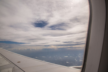 Clouds and sky view from the window of the plane.