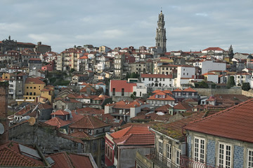 Old houses with red tiles. The most famous neighborhood in the city of Porto – Ribeira.