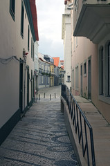 Narrow pedestrian street with beautiful houses. Aveiro. Portugal