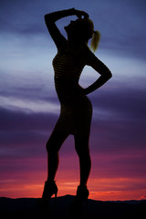 Fototapeta premium silhouette of woman stand side arched back
