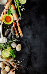 Fresh Seafood and Ingredients on Dark Background