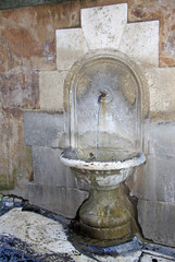 ROME, ITALY - DECEMBER 21, 2012: Drinking fountain at Roman Forum, Rome, Italy
