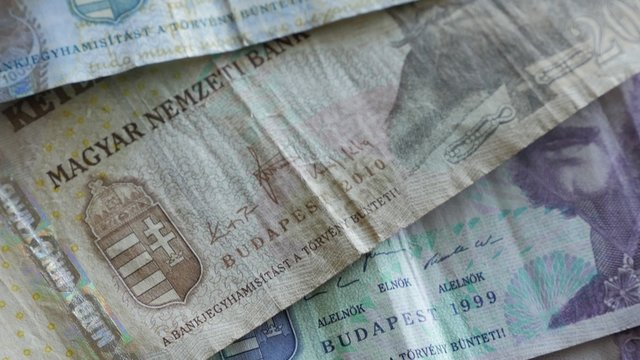 Hungarian paper forint banknotes for the money and business backgrounds 4K 2160p 30 fps UHD footage - Slow tilting over paper HUF money of Hungary 4K 3840X2160 UltraHD video 