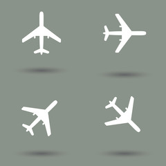 Plane vector icon collection in modern style with shadow, figure and gray background. Symbol of flight and travel.