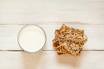 Shortbread cookies with cereals: sesame, seeds and milk. On a wh