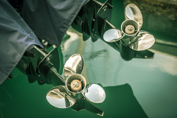 two boat engine with propeller details shot