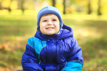 boy in the Park. Autumn. laughs. Age 2 years