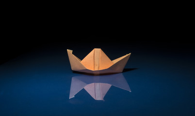 orange paper boat