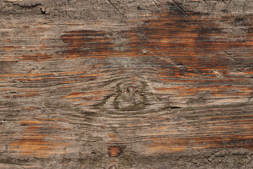 Naklejka premium Old wooden surface with stone chips