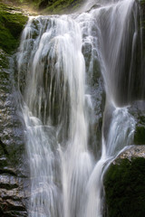 Fototapeta na wymiar Poland. The Karkonosze National Park (biosphere reserve) - Kamienczyk waterfall (fragment)