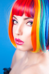 beautiful woman wearing colorful wig